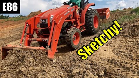 mini excavator on steep slope|kubota mini ex up a slope.